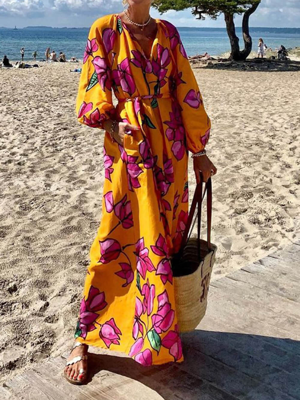 Floral maxi dress with puff sleeves and elegant design